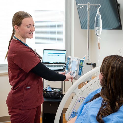 Mid-State Nursing student cares for a patient at the Healthcare Simulation Center.