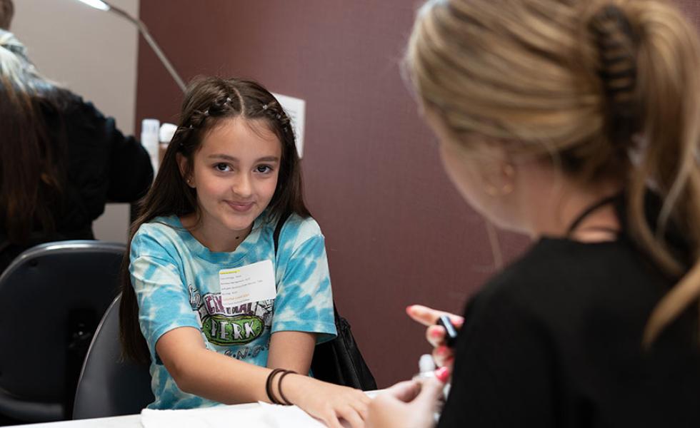 Mid-State Technical College Camp attendee gets her nails done during the Cosmetology session on the Wisconsin Rapids Campus, June 12.