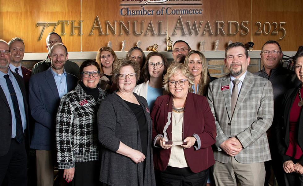 Mid-State Technical College staff and board members after being presented with the Heart of Wisconsin (HOW) Chamber of Commerce Member of the Year award at HOW’s Annual Meeting Awards Banquet on Thursday, March 6, in Wisconsin Rapids, Wis. Holding the award is President Dr. Shelly Mondeik.