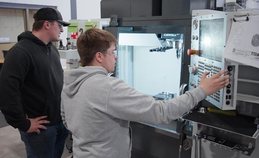 Students operate a CNC machine in Mid-State Technical College’s AMETA Center.