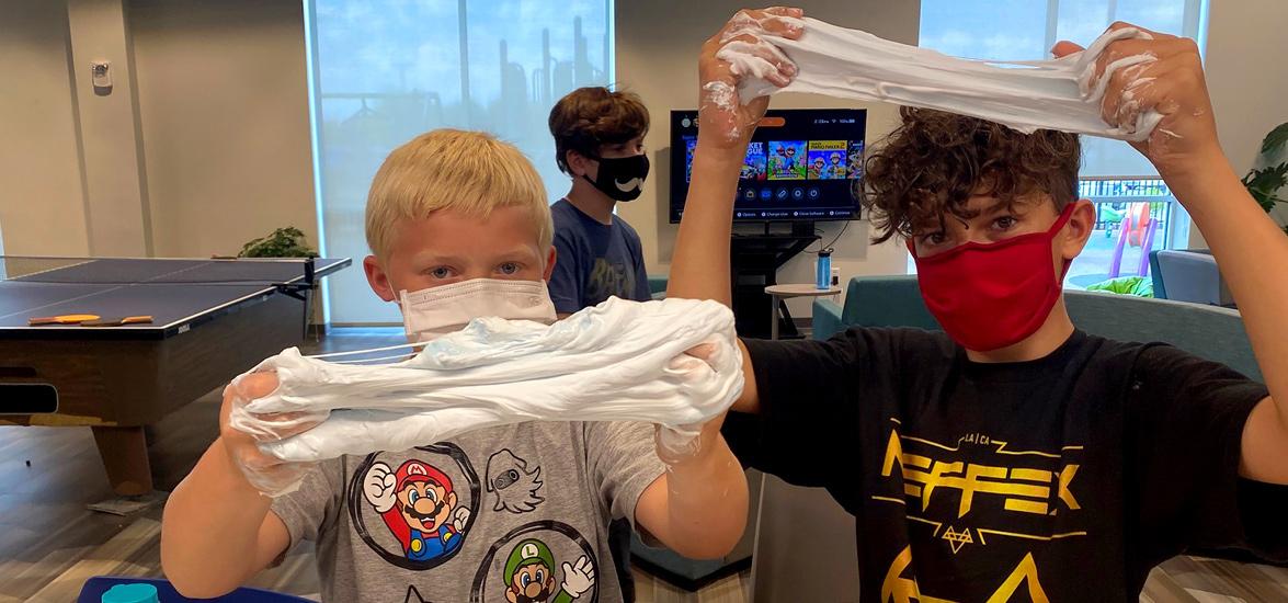 Boys & Girls Club members create fluffy slime, an activity in the Playing with Polymer session during Mid-State’s College Camp on June 9.  