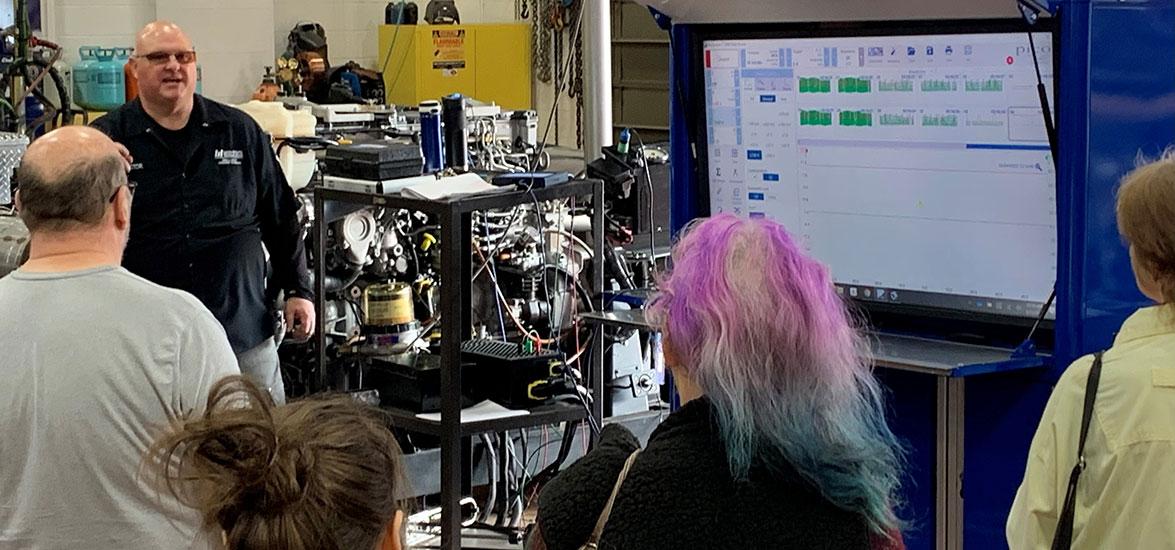 Diesel & Heavy Equipment Technician Instructor Scott Engel demonstrates the role technology plays in diesel careers during the Foster Family Day held at Mid-State Technical College’s Wisconsin Rapids Campus, April 23.