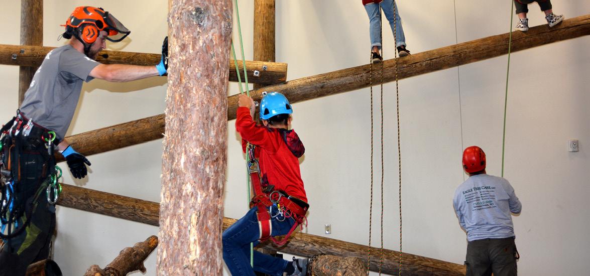 College Camp participants explore the aerial component of Mid-State’s Arborist Technician program on the Wisconsin Rapids Campus, June 8.