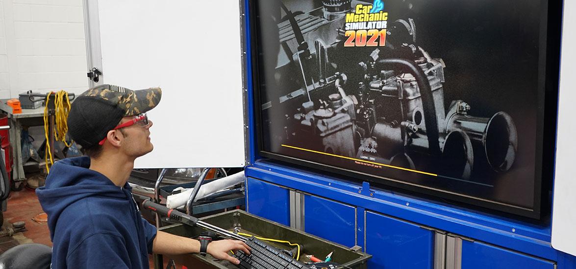 A Program Showcase student participates in a hands-on career exploration activity for Mid-State’s automotive programs during the event on the college’s Wisconsin Rapids Campus, Oct. 26.