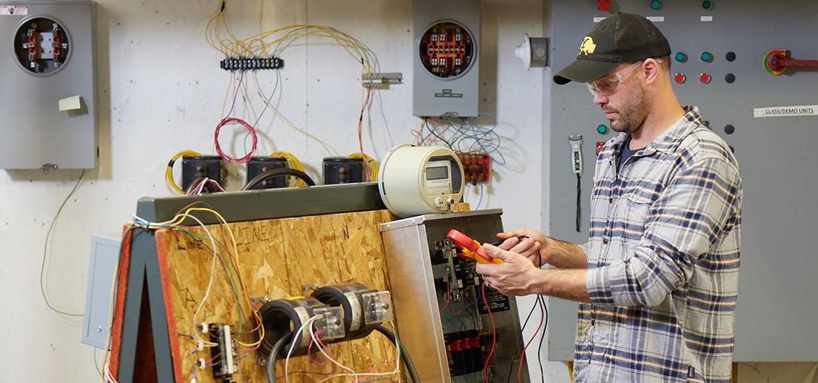 A Mid-State Construction Electrician apprentice practices wiring electric motor control circuits as part of his hands-on training in the program. The apprenticeship is one of 13 offered at Mid-State and eligible for the Tools of the Trade scholarship program each year.