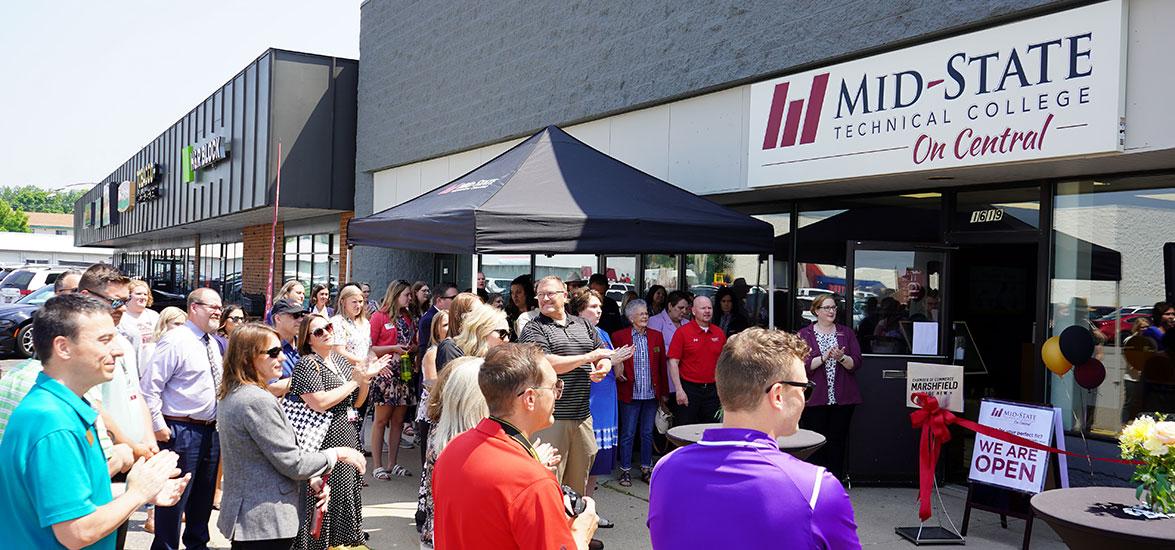 Community members and business partners gather at Mid-State Technical College’s Mid-State on Central location to celebrate the ribbon cutting on Wednesday, June 21.