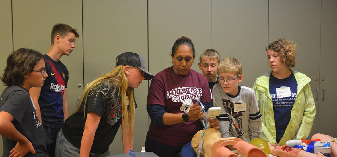 College Camp participants explore the Emergency Medical Technician program on the Wisconsin Rapids Campus. This year’s event will be held on Wednesday, June 12.