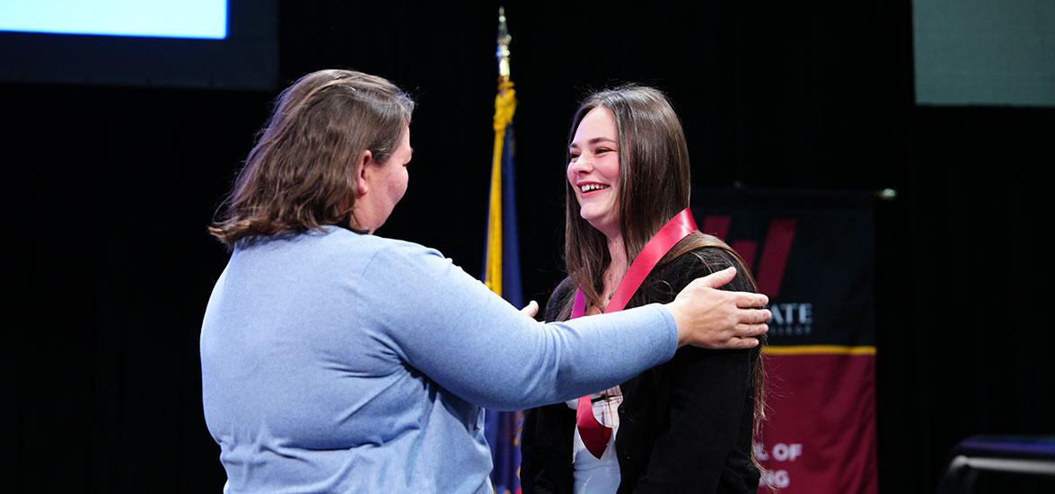 Mid-State Technical College Nursing program graduate Lucy Bootz receives her nursing pin from Mid-State Nursing instructor Sandra Dieck during the College’s pinning ceremony on the Wisconsin Rapids Campus, Dec. 17.