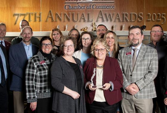 Mid-State Technical College staff and board members after being presented with the Heart of Wisconsin (HOW) Chamber of Commerce Member of the Year award at HOW’s Annual Meeting Awards Banquet on Thursday, March 6, in Wisconsin Rapids, Wis. Holding the award is President Dr. Shelly Mondeik.